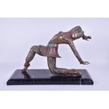 A large decorative Art Deco style cast metal figure in the Chiparus style in the form of a female