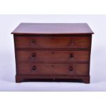 A miniature mahogany chest  with three drawers on bracket feet, 54 cm x 32 cm x 37 cm.