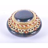 A 19th century of earlier enamel and gilt metal mounted bloodstone pill box the circular cover