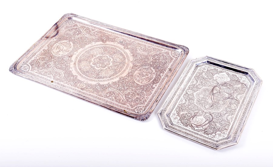 Two Eastern white metal trays   both of rectangular form, with extensive engraved detail and birds