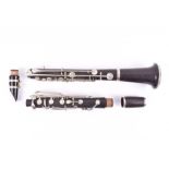 A cased early 20th century clarinet by E.J. Albert Brussels also stamped J. Heyworth & Son, Sole
