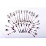 A set of six sterling silver grapefruit spoons London 1926, along with a collection of assorted