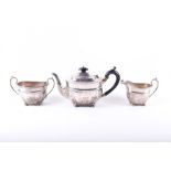 An early 20th century silver tea set Birmingham 1929, S. Blackensee & Co., comprising a teapot