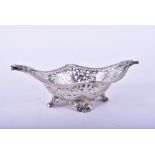 A late Victorian silver dish London 1899, by William Hutton & Sons Ltd, of pierced oval form with