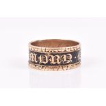 A Georgian momento mori gold and enamel ring the eternity band reading 'In Memory Of', engraved to