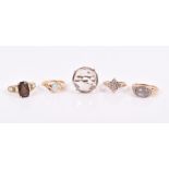 A group of four 9ct yellow gold get set rings together with a 14ct yellow gold and opal ring, all