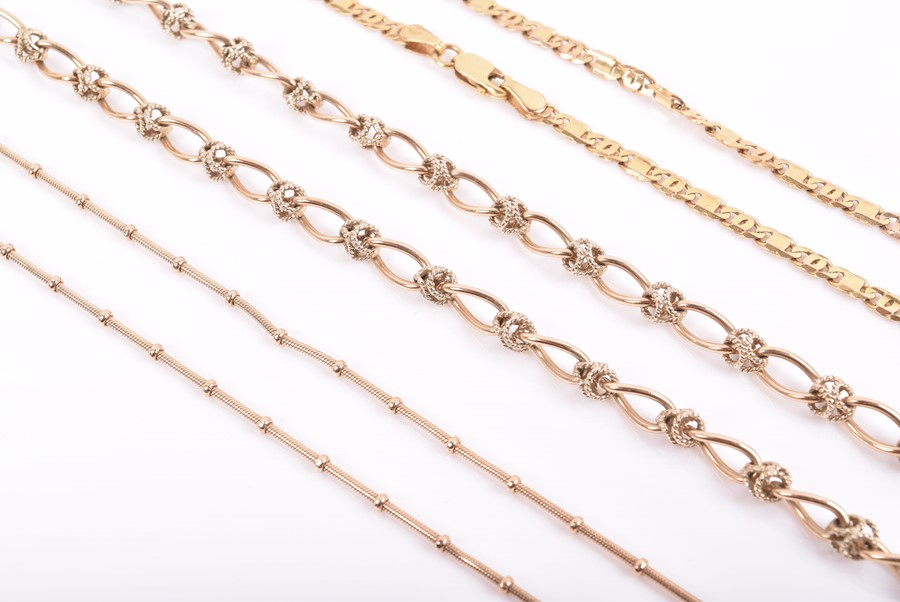 A group of three 9ct yellow gold necklaces of beaded, rope twist and curb link designs. 46 grams. ( - Image 2 of 2