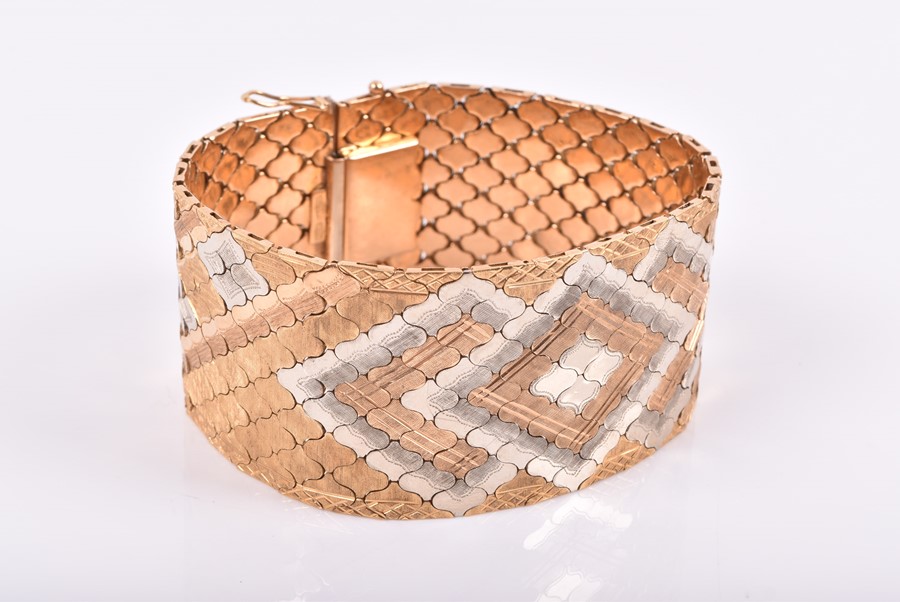 A Continental 18ct yellow, white, and rose gold articulated bracelet of geometric design, with