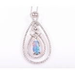 An 18ct white gold, diamond, and opal pendant the slender openwork double frame mount set to