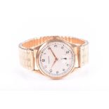 A Garrard 9ct yellow gold mechanical wristwatch the silvered dial with subtle Arabic numeral, and