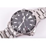 An Omega Seamaster Professional stainless steel quartz wristwatch the black engine turned bezel with