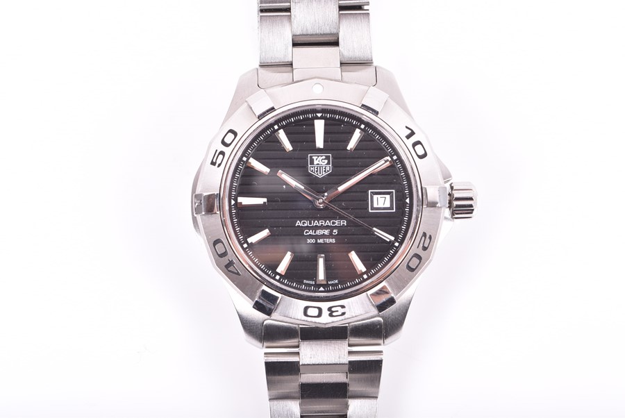 A TAG Heuer Aquaracer Calibre 5 stainless steel automatic wristwatch the black engine turned dial