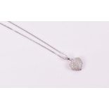 A 9ct white gold and diamond heart-shaped pendant pave-set with diamonds, 1.1 cm wide, suspended