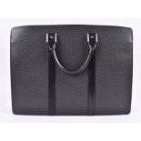 Louis Vuitton briefcase in black the black taiga leather body is finished off with smooth cowhide