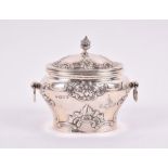 An Edward VII silver tea caddy London 1906, by William Hutton & Sons, of oval bombe form with c
