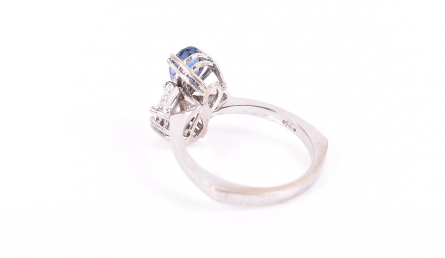 An unusual 18ct white gold, diamond, and sapphire ring in the Toi et Moi style, set with a pear- - Image 2 of 2