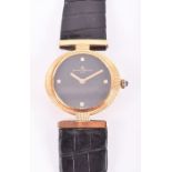 An 18ct yellow gold Baume & Mercier ladies mechanical wristwatch the circular black minimalist