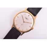 A Longines 18ct yellow gold mechanical wristwatch the silvered minimalist dial with slim baton