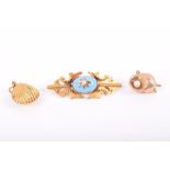 A late 19th / early 20th century yellow metal, turquoise enamel and pearl brooch (tests as 15ct, a/