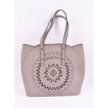 Furla cut-out pattern tote bag in sabbia the fleu-calf leather bag features pierced and gold-tone