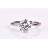 A round brilliant-cut solitaire diamond ring set with a diamond of approximately 1.30 carats,