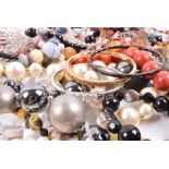 A group of various beaded bracelets and necklaces to include amethyst, fluorite, agate, hardstone,