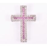 A diamond and pink sapphire cross pendant set with a central cross of square-cut sapphires within