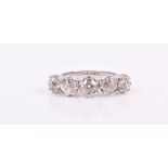 An 18ct white gold and old-cut stone diamond ring set with five old-cut diamonds of approximately