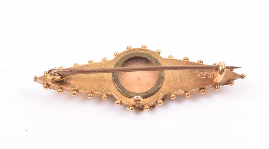 A late 19th / early 20th century yellow metal and pearl brooch with applied filigree decoration, and - Image 2 of 5