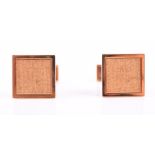 A fine pair of Boucheron 18ct yellow gold cufflinks of square form with textured centre, signed