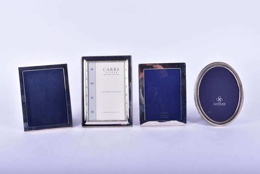 Four contemporary silver photograph frames various dates and makers, two boxed, the largest 18 cm