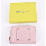 Versace Jeans purse in nude the outer patent body is applied with the Versace Jeans logo, the