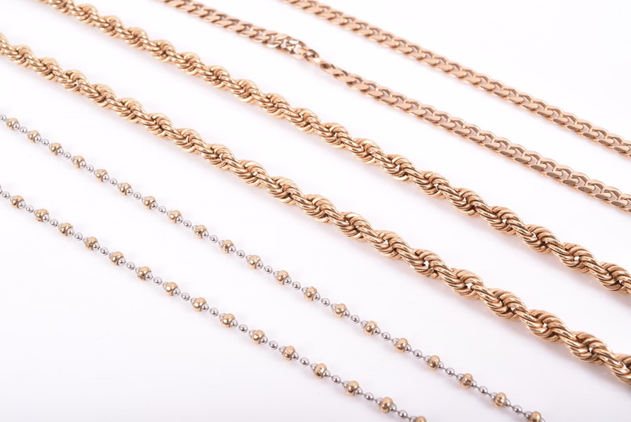 A group of three 9ct yellow gold necklaces of beaded, rope twist and curb link designs. 36 grams. ( - Image 2 of 2