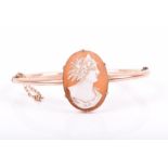 A late 19th / early 20th rose gold cameo bracelet centred with an oval shell cameo depicting a