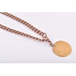 A 9ct rose gold chain set with a George II yellow gold coin pendant, heavily rubbed. 29 grams.