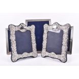 A pair of late 20th century silver mounted frames London 1988, by RBB, mounted on blue velvet