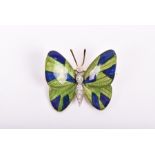 Attributed to Boucheron. A diamond and enamel butterfly brooch the body inset with diamonds, and