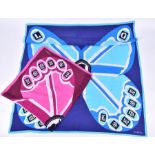 Two Lulu Guinness silk scarves to include a blue silk example with a central cameo and