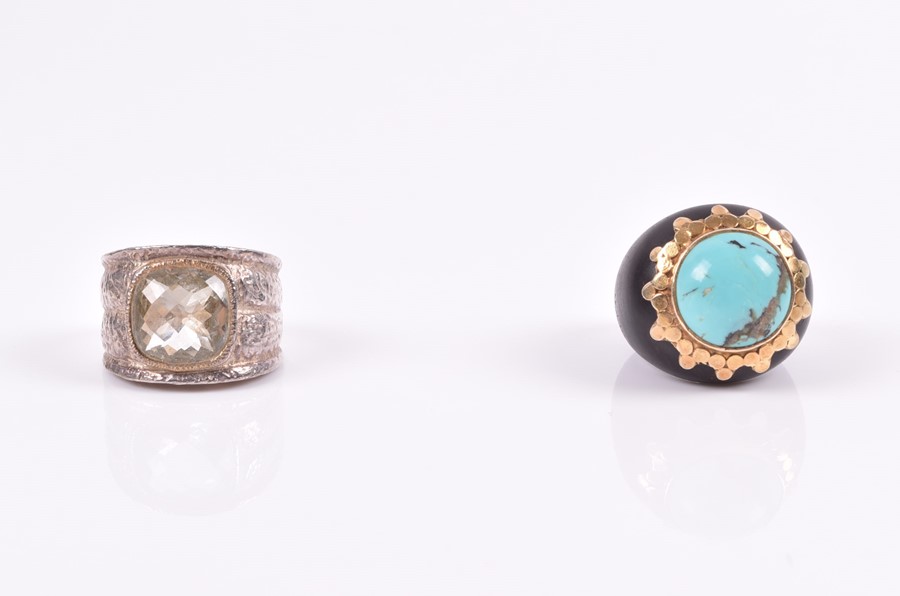 An unusual ebony, turquoise, and yellow metal cocktail ring size N, together with a silver and