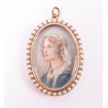 A yellow metal and seed pearl mounted painted miniature pendant of oval form, the portrait depicting