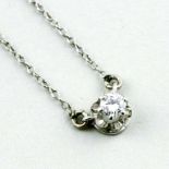 Brillantcollier. 585/000 WG, brutto 2,3 g. Mittig besetzt mit Brillant, ca. 0,25 ct., w/vs. Ketten-