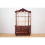 A mahogany display cabinet, probably Dutch colonial, 18th century, H. 195, W. 130, D. 45 cm. Mahonie