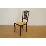 Mahogany chair with yellow upholstery