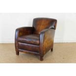 Leren armfauteuil rustend op houten blokpoten Leather armchair