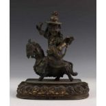 China, metalen sculptuur van mythologisch figuur te paard. [1]