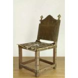 Ghana, Ashanti, wooden chair decorated with embossed copper plating and on the edge of the back of