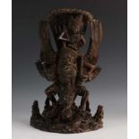 Indonesië, gestoken coromandelhouten sculptuur; Vishnu op Garuda, staand op draak en schildpad h. 30