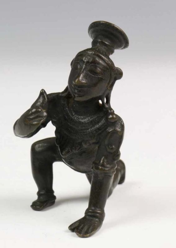 South Indian bronze figure of God Baby Krishna crawling, 18th-19th century. with mango in hand,