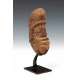 Solomon Islands, stone carved fishing net weight,carved as a anthropomorphic head. Ref. Antony J.