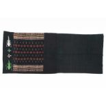 East Sumba, Prailiu, festive sarong, lau hada,with a beaded design of reptiles and floral motives